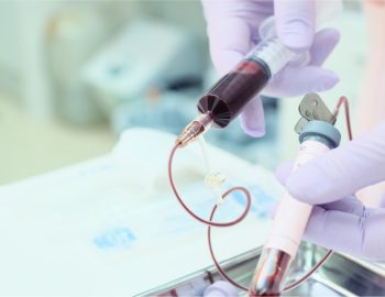 An up close shot of someone drawing blood.